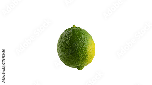 Foto Fresh whole green lime fruit with textured peel and yellow gradient