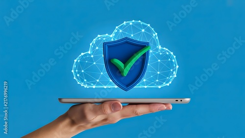 Secure cloud computing concept with shield and checkmark above a hand holding a tablet