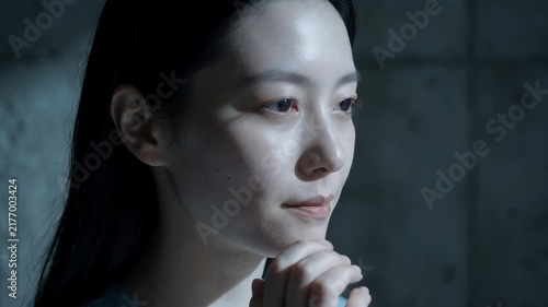Asian Woman Touching Face, Pensive Portrait of Beauty and Reflection