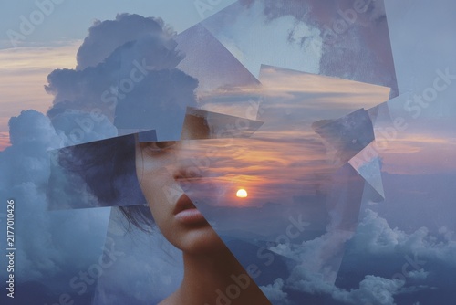 Surreal female portrait double exposure with clouds and sunset fragments for dreamy background and poster design