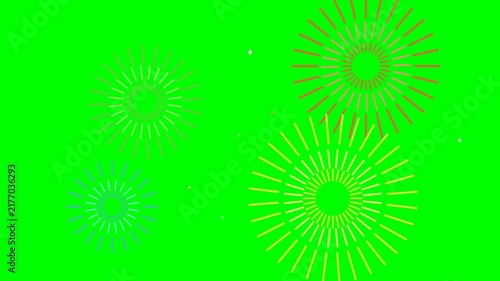 Colorful animated fireworks glowing against a vibrant green chroma key background