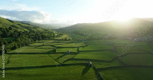 Sunset over green fields in Swaledale