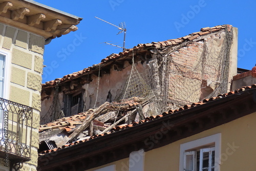 Damaged Old Roof on Urban Building Awaiting Renovation