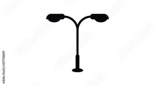 Dual headed street light silhouette graphic design featuring minimalist black shape isolated on a plain light gray solid studio surface