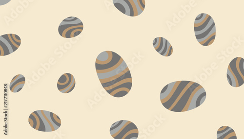 Minimalist pattern of smooth oval river stones featuring abstract grey and beige swirl designs on a light cream colored background surface.