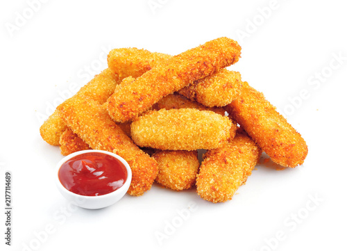 Принти на полотні Fish fingers sticks with ketchup isolated on white background.