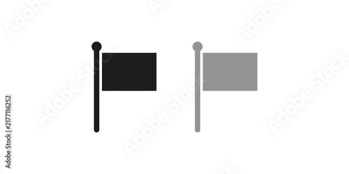 Foto A black flag on a pole with a translucent gray flag nearby on a transparent grid