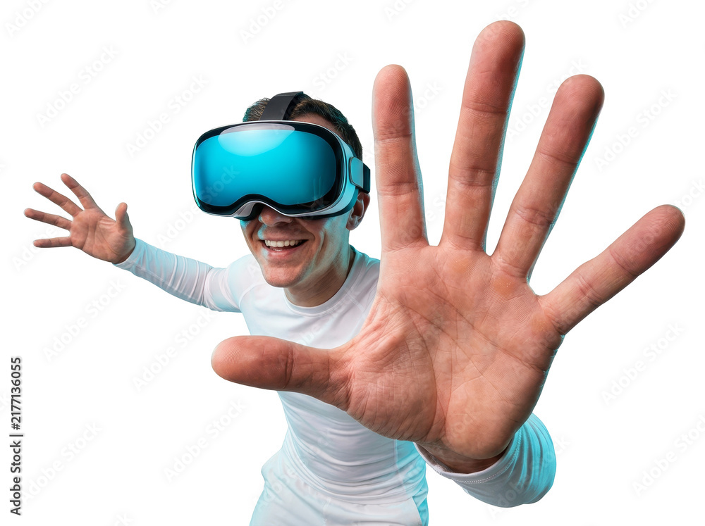 Naklejka premium A smiling man wearing a VR headset, reaching toward the camera with an open hand, on a white background.