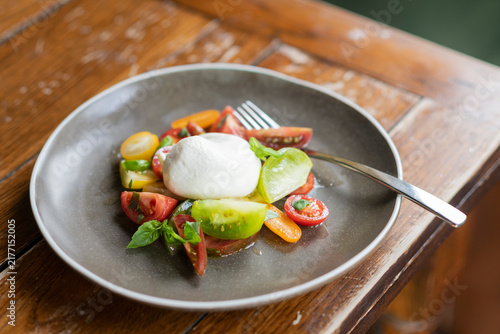 Delightful Summer Salad With Creamy Burrata and Fresh Vegetables