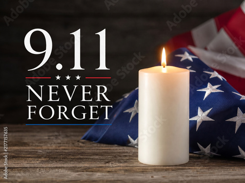 Memorial Tribute with Lit Candle and American Flag for September 11 Patriot Day, Commemorating Fallen Heroes and History