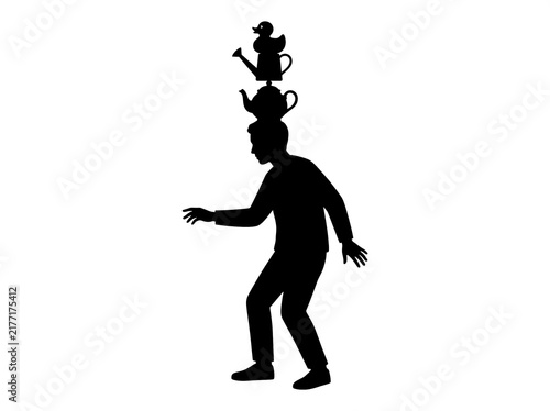 Silhouette of a Performer Balancing a Teapot and a Toy Duck Water Can on his Head while Walking, Isolated on White Background