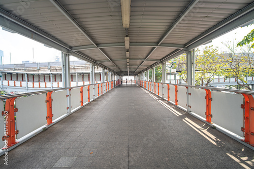 The road to the bts skytrain railway station metropolistic mass transport