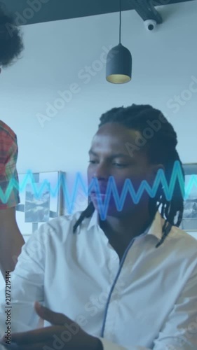 Animation of music equalizer over diverse colleagues discussing over computer at office