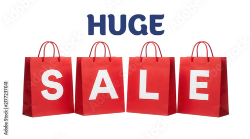 Huge sale sign with four red shopping bags isolated on transparent background