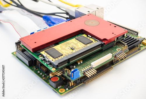 Computer circuit board with chips and connectors on a white background