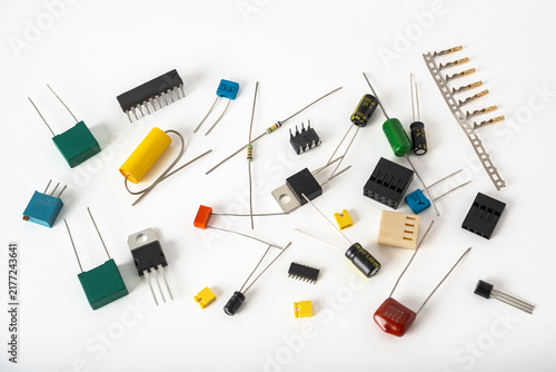 Collection of electronic components on a white background for a DIY project or repair work