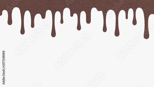 Dark brown paint drip from paper isolated on white background with copy space. Abstract chocolate flowing liquid splash template