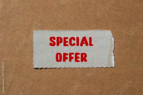 фотографія Special Offer message written on ripped torn paper background