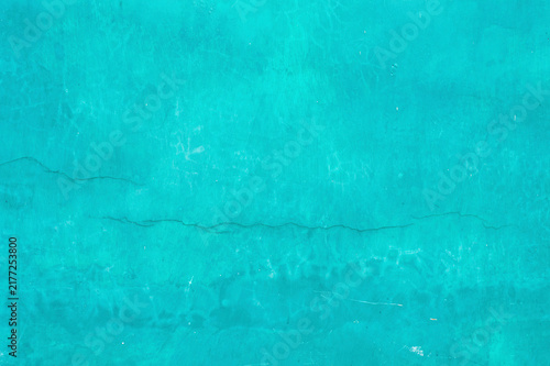 Quadro su tela Abstract full-frame background texture of a bright cyan blue painted wall showin