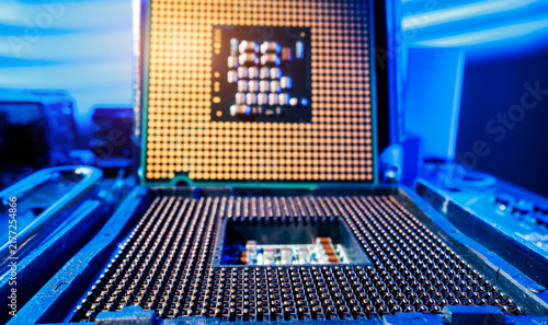 Canvas Print Macro Probe view of cpu microprocessor and motherboard pins with blue accent lig