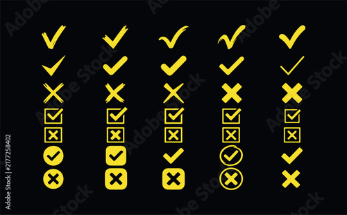 Yellow check marks and crosses in different styles, hand drawn symbols for affirmation and negation on black.