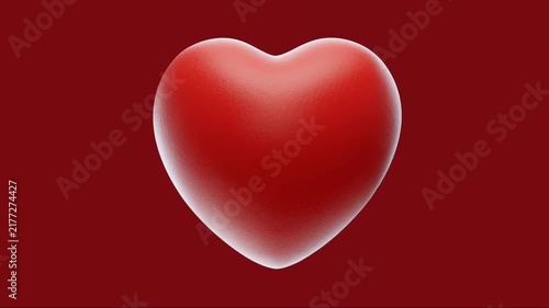 3D Glossy Red Heart Icon Representing Love and Romance on a Dark Red Background