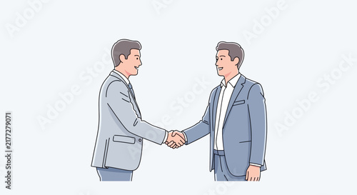 Business professionals shaking hands in agreement outdoors.