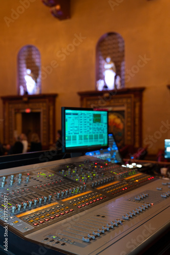 Konstfotografi Vertical video of a professional audio mixing console inside a vintage theater,
