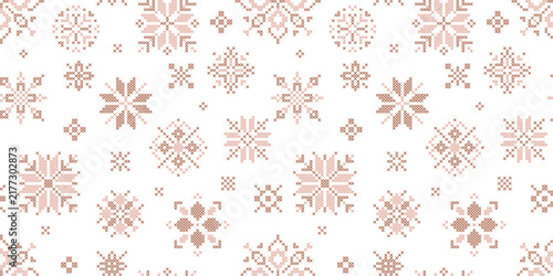Scandinavian cross stitch snowflake seamless pattern, geometric embroidered winter holiday vector illustration cozy Christmas packaging, greeting cards, and fabric printing