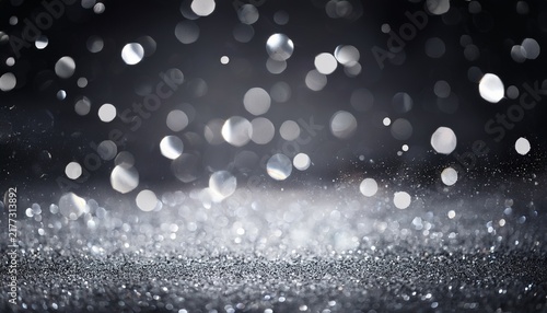 Silver Glitter Texture On Black And Grey Background Glowing Bokeh Particles And Magical Stars