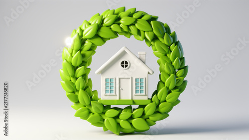 White miniature house surrounded by circular wreath of fresh green leaves on gray background representing eco housing environmental protection sustainable communities and nature centered homes