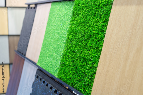 display of various artificial turf and decorative panel samples