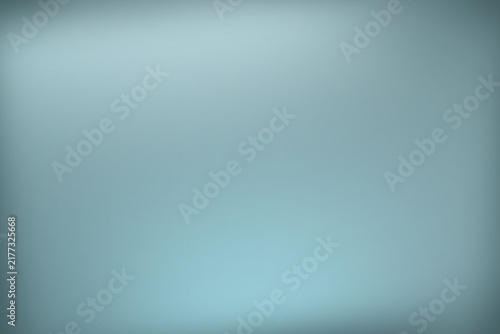 Soft blurred background in shades of blue and green creating a calm atmosphere