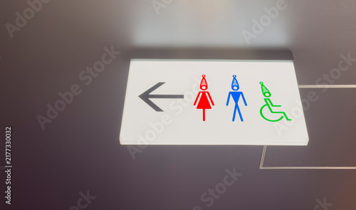 Japan public restroom sign with festive symbols