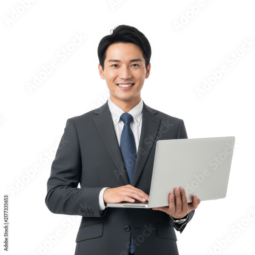 Smiling asian businessman holding a laptop isolated on white background