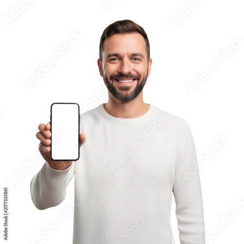 Smiling man holding smartphone happily isolated on white background