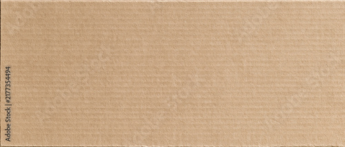 Seamlessly repeating pattern of light brown corrugated cardboard texture, offering a rustic and eco-friendly background with horizontal lines and fibrous details, ideal for packaging,