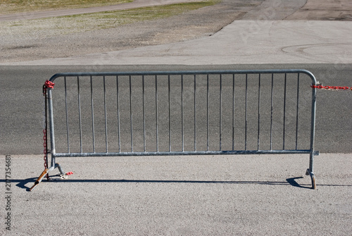 a temporary metal barrier on side of a road