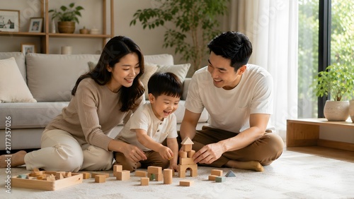 Young family playing with child at home