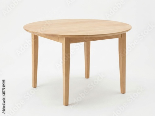 Modern round wooden dining table isolated on white background