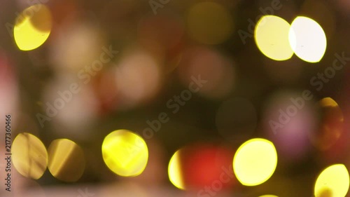 Festive Warm Bokeh Lights Flickering Slowly Against Dark Background