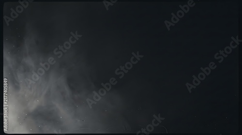A dark and moody abstract background featuring a textured smoked celluloid surface with subtle light leaks and vintage film grain