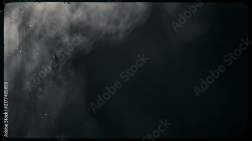 A detailed close up view of a dark smoked celluloid surface featuring vintage film texture and distressed aesthetic elements