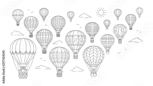 Hot Air Balloon Collection: A vibrant and whimsical collection of hot air balloons, each with intricate designs, gracefully ascend into a bright, sunny sky dotted with fluffy clouds.