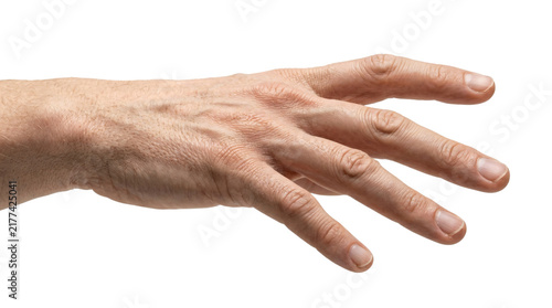 A mature adult male arm reaches forward with an open palm gesture to grasp something intangible while representing human interaction and nonverbal communication signals within a professional
