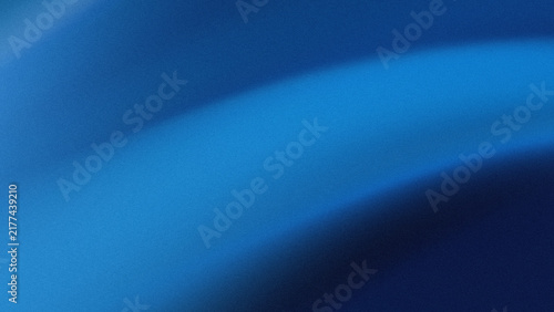 Smooth blue fabric background with elegant soft waves and deep shadows