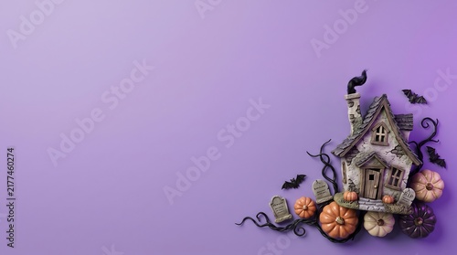 Spooky halloween haunted house with flying witch and bats, purple sky