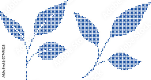 Two blue cross stitch leaf sprigs for spring decoration