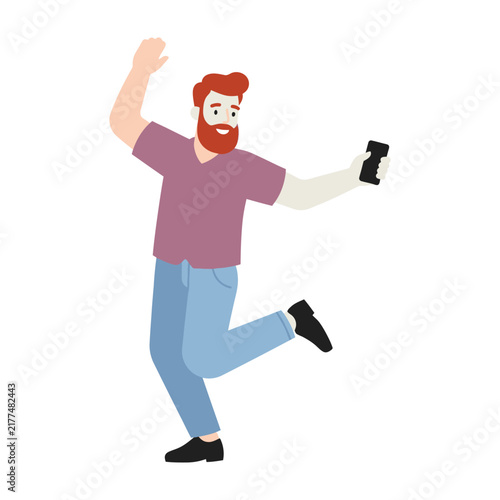 Smiling redhead man in casual clothes holding dumbbell and exercising