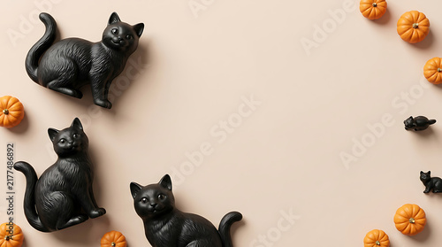 Halloween black cats and pumpkins festive flat lay arrangement